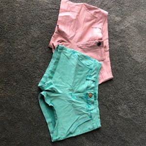 Bke shorts size 27. Available in blue and pink.